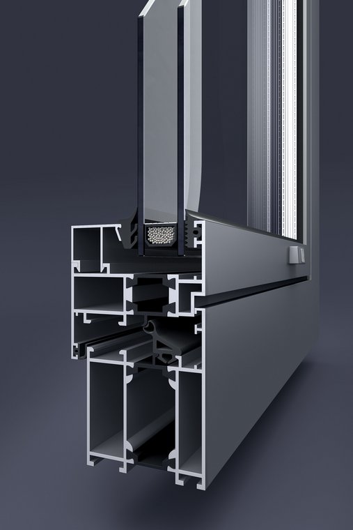 3D Visualization of a detailed cross-section of the Aluprof aluminum window profile showing insulation and multi-chamber structure.