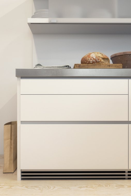 3D Visualization of a Bulthaup kitchen worktop with fresh bread and stylish decorative elements.