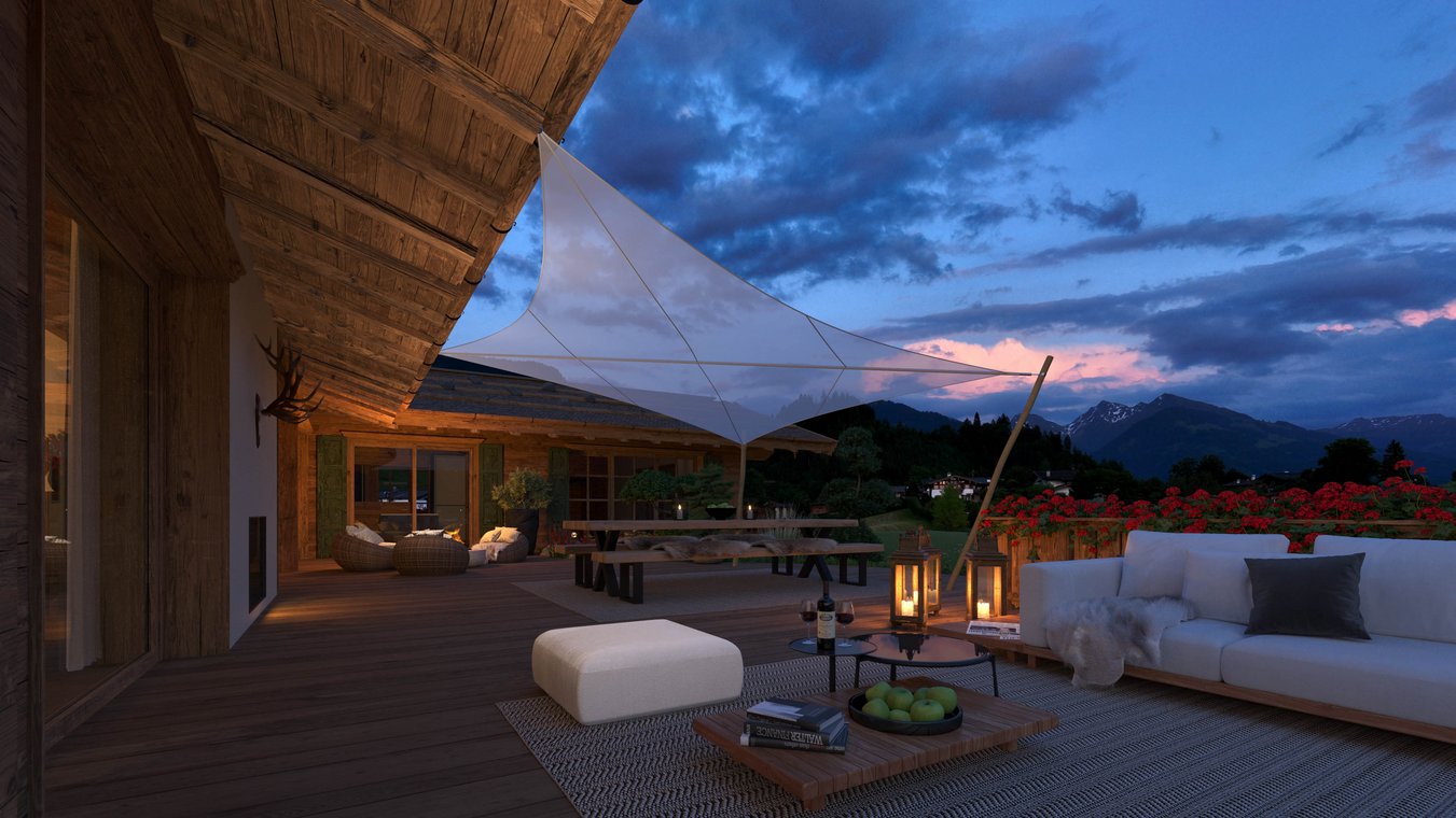 3D Visualisierung einer luxuriösen Chalet-Terrasse in Kitzbühel bei Sonnenuntergang, mit gemütlichen Sofas, Laternen und Blick auf die Alpen.