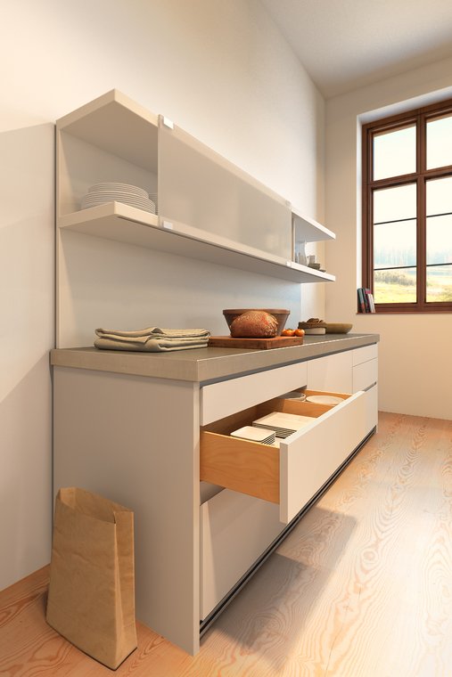 3D Visualization of a Bulthaup kitchen worktop with fresh bread and stylish decorative elements.