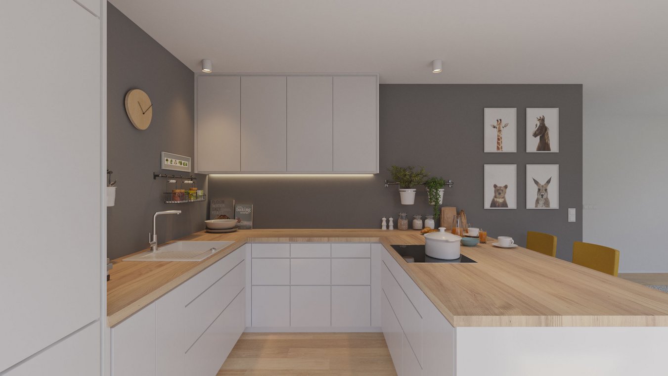 Bright U-shaped kitchen with wooden countertop and modern built-in appliances.