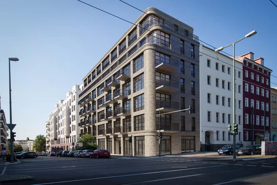 3D Visualization of a modern residential and commercial building on Landsberger Allee in Berlin, featuring a distinctive brick façade, large glass windows, and rhythmically arranged balconies.